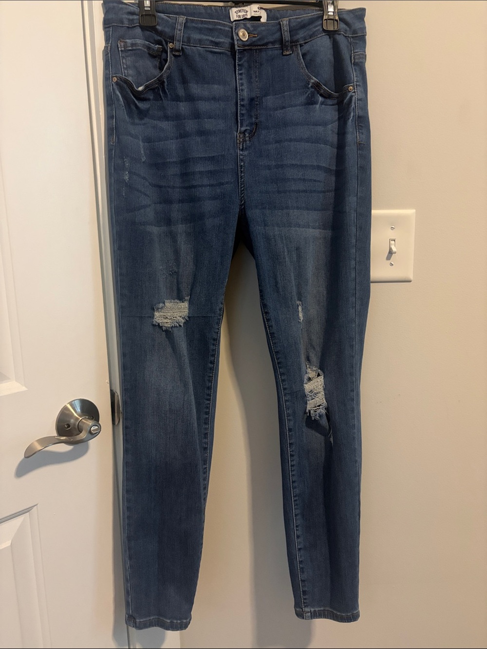High-Waisted Distressed Dark Blue Skinny Jeans